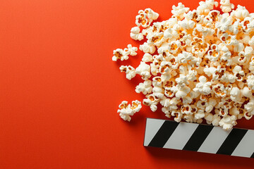 A minimal approach with a block of cardinal-hued popcorn neatly packed in a square, the clapperâ€™s