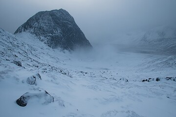 Wall Mural - snowy mountain valley shrouded in mist