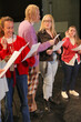 © Caia Image - Persons with disabilities holding script