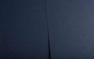 Fototapete - Navy blue paper background with a matte, fibrous texture and subtle perforated details. Deep, rich tones and geometric patterns create an elegant, luxury design, perfect for high-end stationery or.