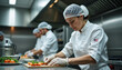 © Arra Vais - Chefs preparing food in a professional kitchen highlighting hygiene and safety practices