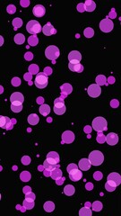 Fototapete - Colorful pink circles move dynamically across a dark backdrop in an abstract display of motion and design.  Vertical video. 