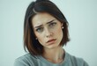 © iushakovsky - Female portrait with cold-colored pastel background