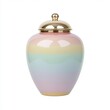 © Megin Design - Colorful ceramic urn with gold lid on white background