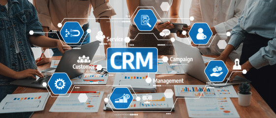 Fototapete - Analyst team utilizing BI Fintech to analyze and pointing at financial dashboard paper office. Businesspeople examining report paper on table for business insight. Panorama shot. Scrutinize Amity