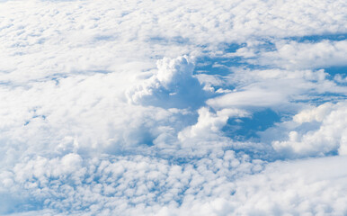 Wall Mural - Sky clouds background. Blue Heaven and white clouds. White cloudy Heaven with soft sun light. Clouds on pastel blue sky background. Sky Landscape Background. Sky Clouds Wallpaper.