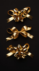 Aufkleber - Shiny golden bows and gift wrapping ribbons arranged vertically on a black background creating an elegant and festive atmosphere