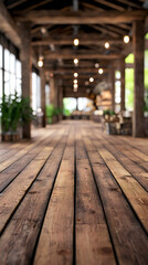 Poster - Empty wooden floor extending into blurred industrial style restaurant interior with hanging light bulbs