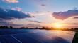 © Worakit - Solar panels in serene countryside setting during sunset, showcasing renewable energy solutions and sustainable future