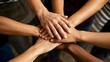 © riedoak - Stack of hands showing unity and teamwork