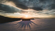 © Cavan Images - Dramatic shadow of island in Moosehead Lake, Maine, winter.