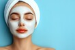 © Basileus - Woman with closed eyes wearing a facial mask and towel