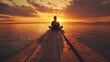 © rak - contemplative soul meditating at sundown on a pier bathed in orange light and cloudscape horizon