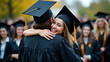 © Netaya - Emotional Graduation Moment: Young Female Graduate Hugs Mother in Celebration