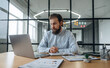 © standret - Focused at work. Businessman is in the office