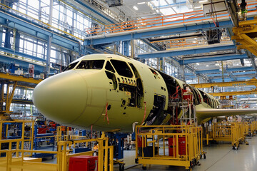 Poster - Aircraft assembly process at aerospace facility in progress Generative AI