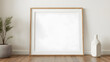 © Basis studio - Empty frame mockup, ISO A paper size. Living room wall poster mockup. Interior mockup with modern design. 3D render