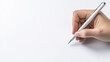 © Chineewan Somsap - hand holding silver pen poised over blank white sheet, ready to write