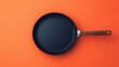 © Bimha - Empty frying pan, orange background, cooking (1)