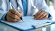 © David Zarzosa - Close up of a doctor’s hands writing on a medical document with a pen, writing a diagnosis or patient record.