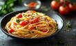 © Анна Терелюк - Tasty spaghetti with herbs. A bowl of spaghetti topped with fresh tomatoes and herbs, showcasing vibrant colors and a wholesome meal preparation.
