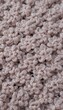 © Kitta Studio - Soft Pink Crochet Texture with Flower Motif for Cozy Decor