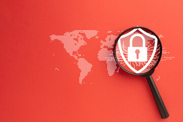 close-up of a magnifying glass focusing on a digital shield with a lock, symbolizing cybersecurity, 