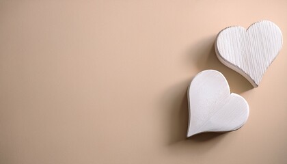 Wall Mural - couple of white wooden hearts on light beige background, copy space- 52839