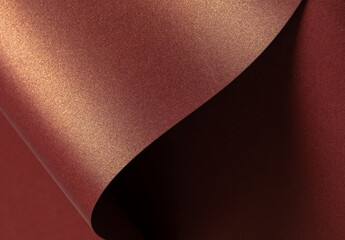 Fototapete - Burgundy paper background with a glossy, pearlescent texture and shimmering metallic finish. Rich warm tones and smooth gradients create an elegant, luxurious design with reflective curves, perfect.
