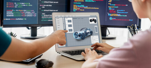 Electric car design software on computer screen showing simulation blueprint brisk by digital calculating application for manufacturing preparation