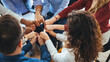 © Dragana Gordic - Diverse Team Members Connecting Hands in a Symbol of Unity and Support