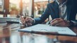 © Hamza - Real estate agent talked about the terms of the home purchase agreement and asked the customer to sign the documents to make the contract legally, Home sales and home insurance concept.