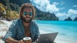 © Lakshmi - Man working on laptop on tropical beach