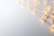 © Natchanok - Abstract network connection concept with golden nodes and lines on a clean white backdrop illuminated with gentle light