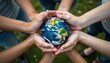 © Alex - Multiple hands cradle a small globe, emphasizing unity, care, and the collective responsibility to protect Earth. This scene highlights the spirit of cooperation on World Environment Day