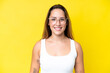 © luismolinero - Young caucasian woman isolated on yellow background With glasses with happy expression