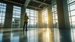 © vasyan_23 - Female caucasian architect in safety gear inspecting sunlit building interior