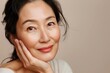 © Rawpixel.com - Happy asian woman in 40s having skincare spa day face dimples female.