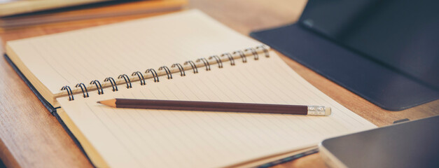 Wall Mural - agenda, planner book, calendar, and pencil place on business office desk. diary for organizer to pla