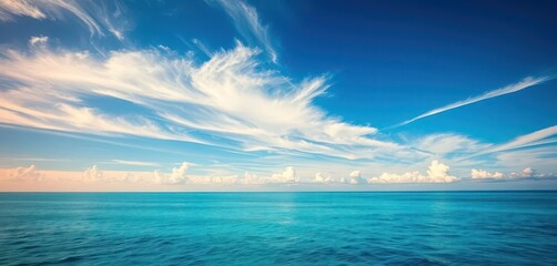 Wall Mural - Azure expanse, wispy white clouds drift lazily, image, heaven
