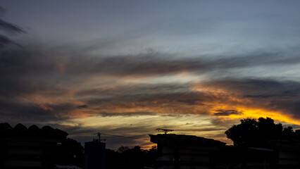 Wall Mural - sunset sky with clouds and electricity post. beautiful sky background.
