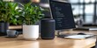 © CreativeSeven  - Innovative office workspace with smart speaker and green plant modern office technology concept minimalist environment