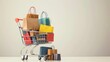 © Galib - A shopping cart full of bags on a white background.