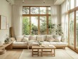 © RaksaLinggo - A bright and airy living room with a large window and plants