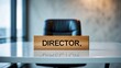 © NFTNexus - Wooden office plate for director on glossy white table with vacant chair in the room.