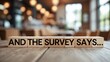 © NFTNexus - Wooden blocks displaying the phrase 'And the Survey Says...'