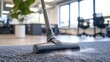 © Cozirlax - Vacuum Cleaning in Open Office Space with Modern Design and Bright Natural Light