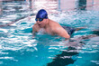 © Jack Tamrong - Fat Asian male swimmer swimming breast stroke action in pool