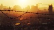 © shameem - The abstract image of barbed wire against the bustling