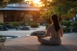© Bojan - Woman meditating in zen garden at sunset, finding inner peace and mindfulness